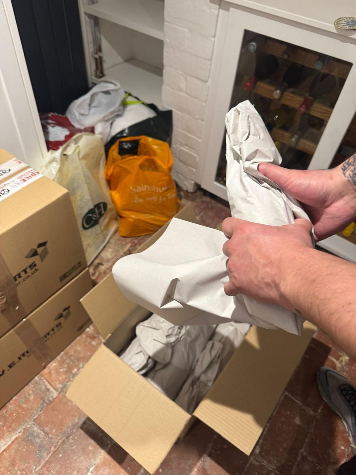 Careful wrapping of fragile items before a move