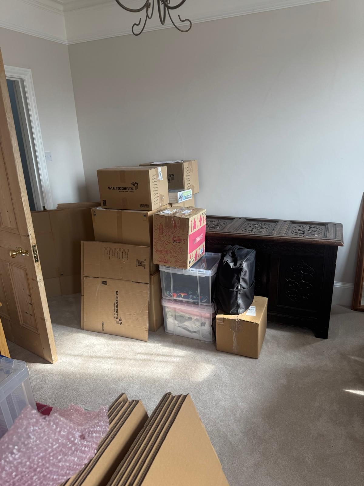 Boxed and ready lounge before a house move